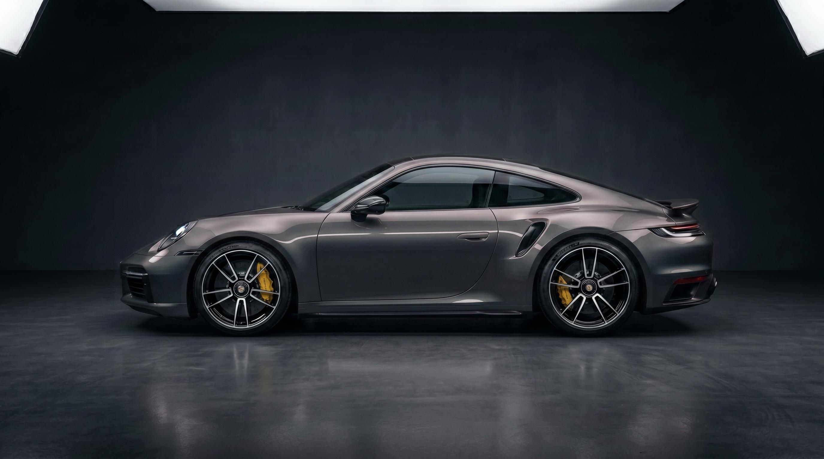 Modern red Porsche 911 Turbo S with mirror-finish paint — after Obsidian Surface Lab ceramic coating and paint correction